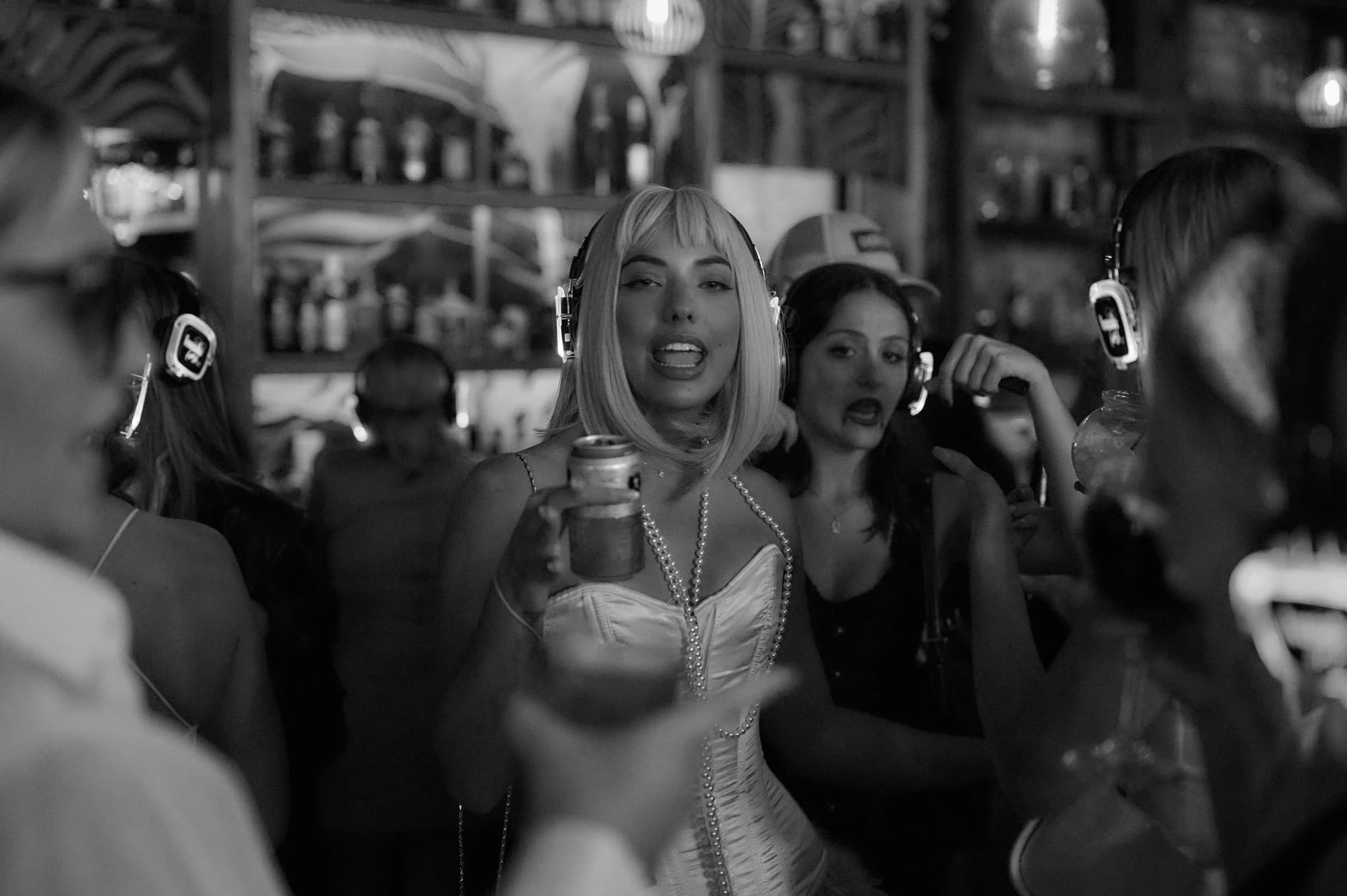 Guests at a lively bar tattoo activation